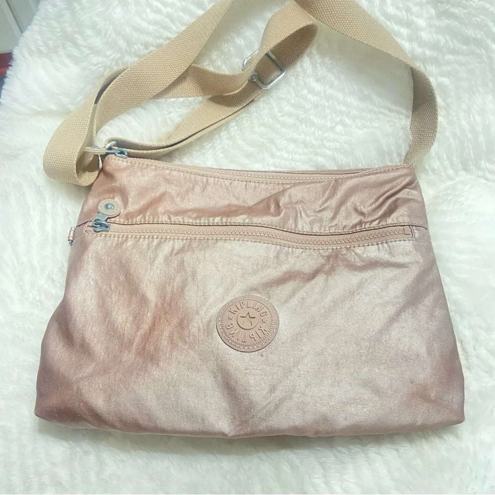 Rose Gold Kipling Pink Crossbody Bag with Signature Style